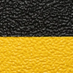 Alfombra antifatiga Sof-Tred negra con bordes biselados amarillos, de 122cm x metro — Detalle del producto